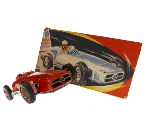 TIN PLATE TOY MERCEDES BENZ RACE CAR BY JNF OF WEST GERMANYwith red body, chrome side exhausts, wind shield, and functioning 