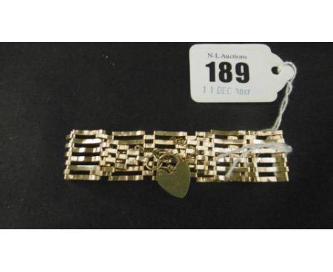 A 9CT GOLD GATE BRACELET, 14 GRAMS