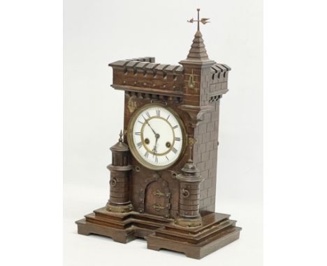 A large 19th century Black Forest Junghans ‘Castle’ mantle clock. With pendulum. 33x19x53cm 