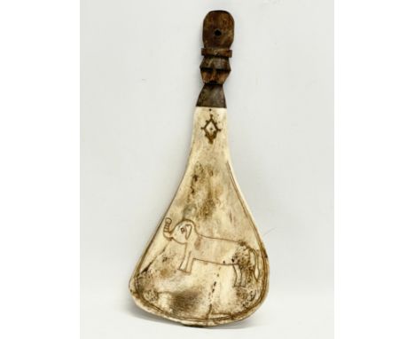 A vintage bone scrimshaw fan. 18x41cm 