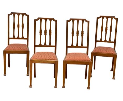 A set of 4 vintage mahogany dining chairs. 