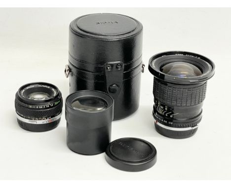 A collection of vintage camera lenses. 