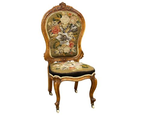 A good quality Victorian carved walnut side chair with original tapestry upholstery on cabriole legs. 