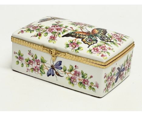 An Atelier Le Tallec, Paris hand painted porcelain trinket box. Limoges France. 14x9x16cm 