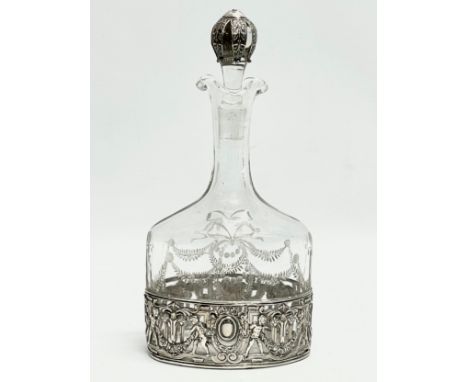 A 19th century silver mounted etched glass decanter. Stamped B.H.M. 925. 24.5cm 