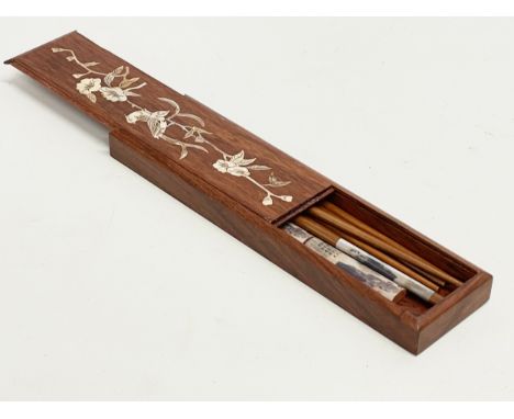 A Chinese rosewood and Mother of Pearl chopsticks and case. 26.5cm 