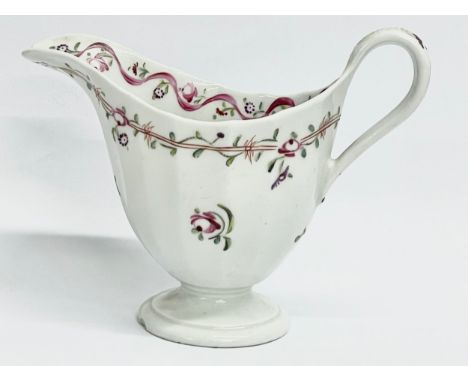 A late 18th century New Hall ‘Pink Ribbons’ porcelain cream jug. Circa 1790. 13x6x10cm 