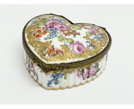 A 19th century Meissen porcelain trinket box with hand painted flower and gilding decoration. 8x8x3.5cm 