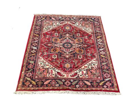 A large vintage Middle Eastern hand knotted rug. 179x253cm 