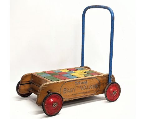 A vintage Tri-ang Baby Walker 