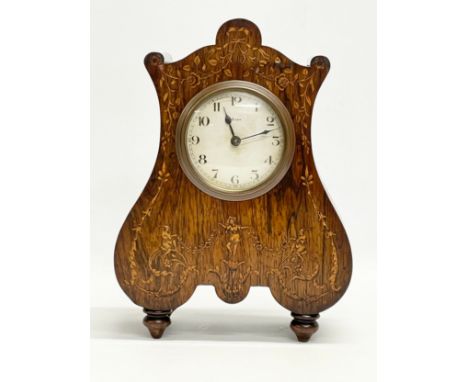 A late 19th century French inlaid rosewood mantle clock. 20x10x28cm 