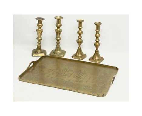 A good quality vintage brass Chinese style tray and 2 pairs of Victorian brass candlesticks. Tray 51x36cm. 