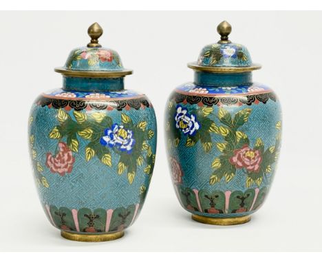A pair of late 19th/early 20th century Chinese cloisonné enamel urns with lids. Circa 1900. 21cm 