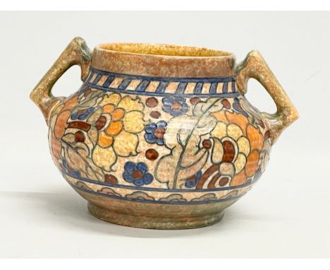 A 1930’s Charlotte Rhead ‘Byzantine’ 2 handled pot. 23x20x15cm 