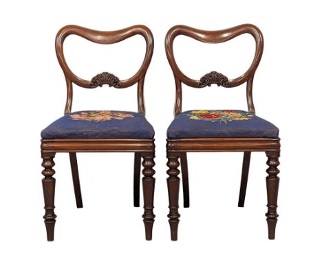 A pair of good quality Victorian mahogany balloon back chairs with tapestry seats. 