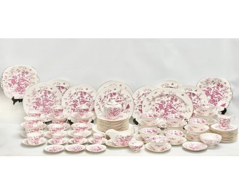 A 103 piece Coalport pink and white ‘Cairo’ porcelain tea, coffee and dinner service. Circa 1926-1951. Including a teapot, 12