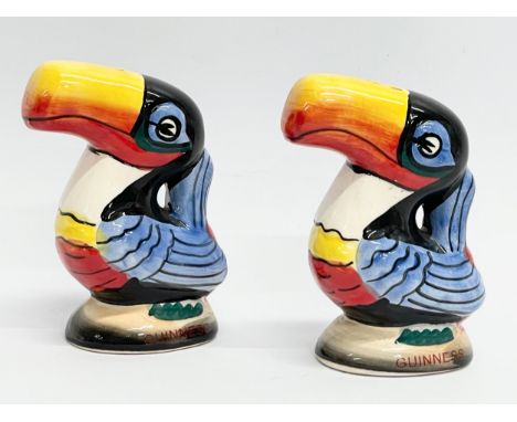 A pair of vintage Guinness toucan salt and pepper shakers. 