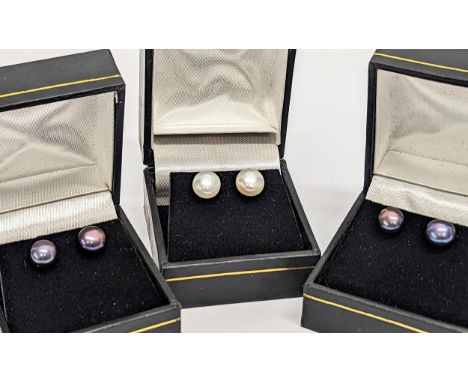 3 pairs of pearl earrings. 