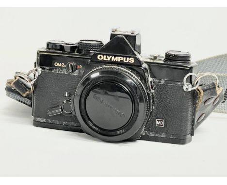 A vintage Olympus OM-2n camera. 