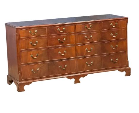 A large Georgian style inlaid mahogany multi drawer chest of bracket feet. 155x49x80cm 