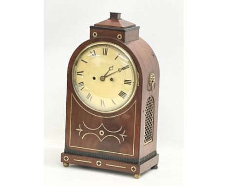 A large Regency mahogany brass inlaid double fusee mantle clock with pendulum. 27x16x50cm 