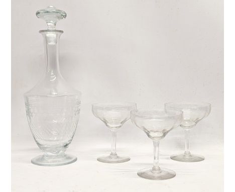 A vintage etched glass drinks set. Decanter measures. 33cm 