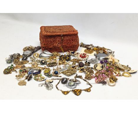 A collection of vintage brooches, necklaces, earrings, etc. 