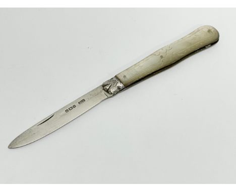 A silver and Mother of Pearl fruit knife. 14.5cm open. 