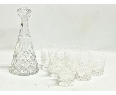 A set of vintage crystal whiskey glasses and matching decanter. Glasses 10cm. Decanter 29cm 