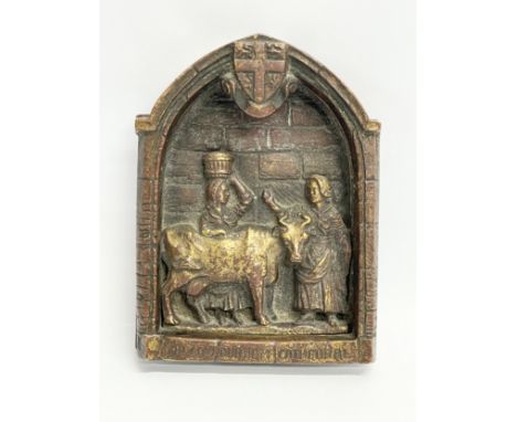 An early 20th century brass Dun Cow Durham Cathedral door knocker. 7x9.5cm 