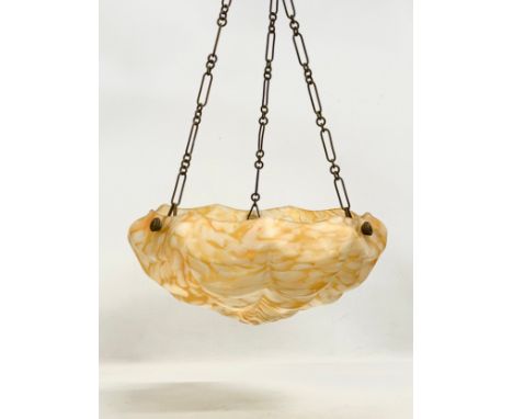 A large 1920’s Art Deco glass light shade. 40x70cm including hanging chain. 