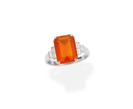 Fire opal and diamond ringThe step-cut fire opal between baguette-cut diamond shoulders, ring size MFor further information o