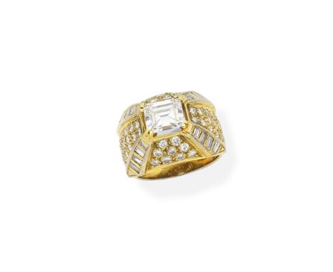 Diamond dress ringSet with a step-cut diamond, weighing 2.11 carats, within a bombé mount set with brilliant, baguette and ta