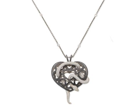 Diamond chain, 2006, and diamond pendant, 2007, by Theo FennellThe brilliant-cut diamond serpent with circular-cut ruby eyes,