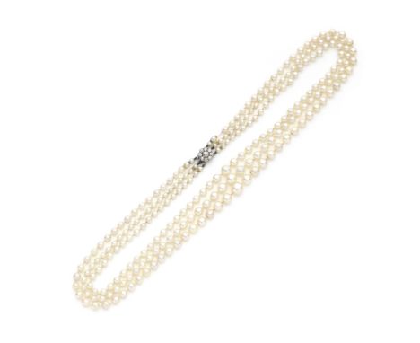 Cultured pearl necklace and opal pendant1st: The three strands of 3.0mm-8.0mm cultured pearls to an old brilliant-cut diamond