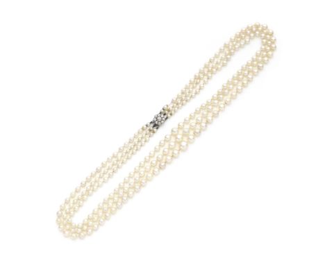 Cultured pearl necklace and opal pendant1st: The three strands of 3.0mm-8.0mm cultured pearls to an old brilliant-cut diamond