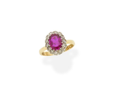 Ruby and diamond cluster ringThe oval-cut ruby, weighing 1.82 carats, in a surround of rose-cut diamonds, maker's mark, ring 