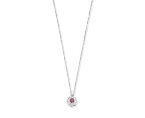 Graff: Ruby and diamond cluster pendantThe circular-cut ruby, weighing 0.19 carat, within a border of brilliant-cut diamonds,