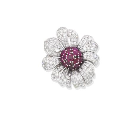 Ruby and diamond flower broochThe openwork flowerhead set with circular-cut rubies, brilliant and single-cut diamonds, diamon