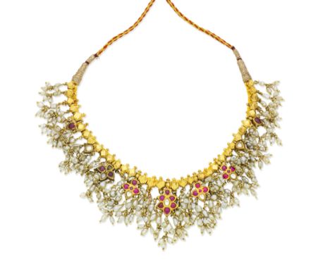 South Indian seed pearl and gem-set fringe necklace, 19th centuryThe chain of geometric beads suspending floral motifs of foi