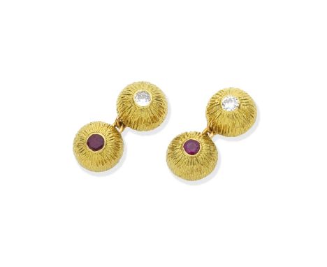 Ruby and diamond cufflinksDouble-sided, each textured bombé plaque inlaid with a circular-cut ruby or brilliant-cut diamond, 
