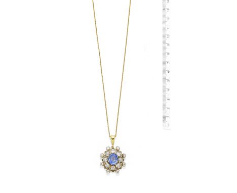 Sapphire and diamond pendantOf flowerhead design, set with a central oval-cut sapphire, weighing 7.71 carats, the petals set 