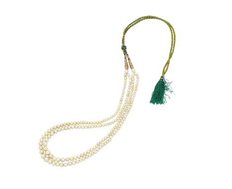 A two-strand natural pearl necklaceThe natural pearls measuring 3.6-8.2mm, on an adjustable green, blue and gold-coloured wov