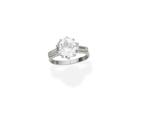 Diamond single stone ringThe old brilliant-cut diamond, weighing 3.60 carats, between step-cut diamond shoulders, ring size N