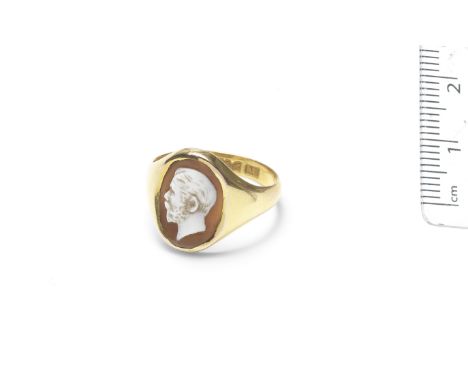 A shell cameo ring of a man, 19th-20th centuryThe portrait of George V in profile facing left, with short hair and clipped be