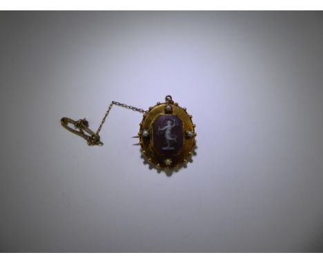 An Antique 14ct Yellow Gold (tested) and Seed Pearl Cameo Brooch/Pendant, approx 27 x 22 mm and 6.1 gms.