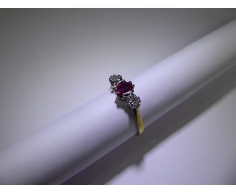 An Antique 18ct Yellow Gold Diamond and Ruby Ring, 2 x 10 pt dias, 5 x 4 mm ruby, size Q, approx 3.3 gms.