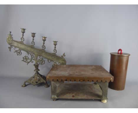 Miscellaneous Items including a Trench Art Door Stopper, unusual candlestick (wf), and a brass food warmer. (3) .