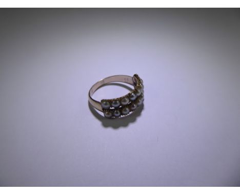 An Antique 9ct (tested) Yellow Gold and Pearl Ring, the ring set with two rows of high-lustre pearls, size N, approx 2.6 gms.