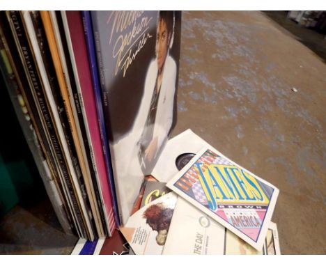 Thirty two mixed singles and LPs to include Michael Jackson. Not available for in-house P&amp;P 